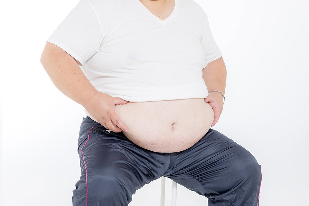 お腹の肉がものすごい男性