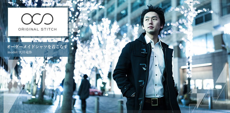 オーダーメイドシャツを着る男性の写真素材