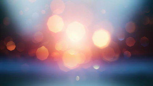 ぼんやりボケた光の玉が浮遊する光景とグラデーション背景