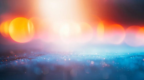 夜明けの都市風景に輝く光の交じり合いと玉ボケのグラデーション