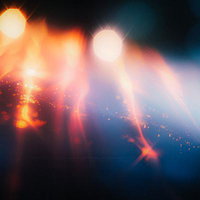 光の粒が散りばめられた神秘的な世界 テクノロジー背景の写真