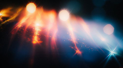 光の粒が散りばめられた神秘的な世界 テクノロジー背景