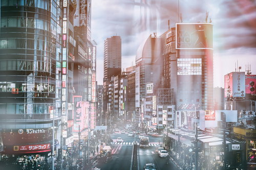 高層ビルが立ち並ぶ都市部の街並みと袖看板