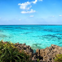 与論島の夕暮れビーチと南国の海の写真