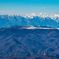 冬の美ヶ原とアルプス山脈の雪景色の写真