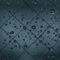 ワイヤーの窓に付着した水滴と雨の天候表現の写真