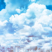 建物の頭上にある絵に描いたような積乱雲の夏風景の写真