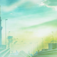 夕焼け空に浮かぶスカイツリーと街並みのシルエットの写真