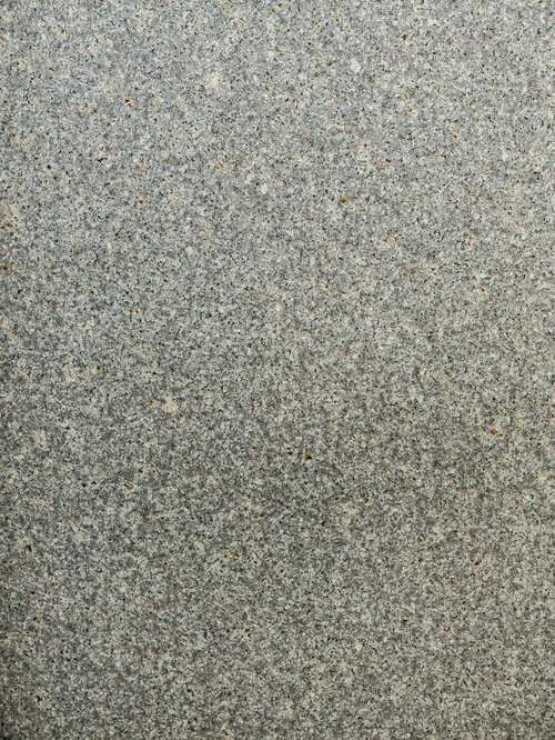 傷一つない石材タイル張りの床のテクスチャー