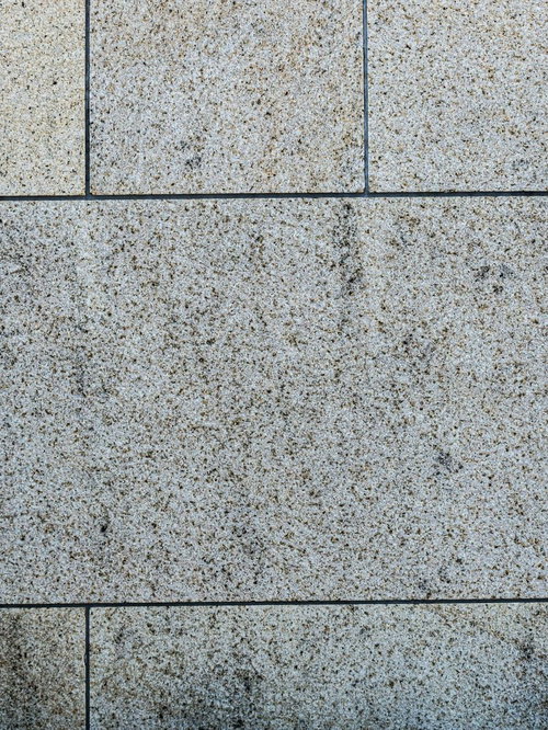 グレー系の石材タイルを張り合わせた床のテクスチャ