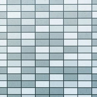 うっすらと残るブルーグレーのタイル外壁のテクスチャーの写真