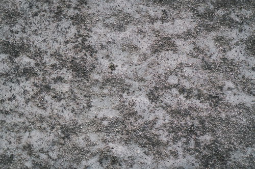 ザラザラした粗いグレーの壁のテクスチャー