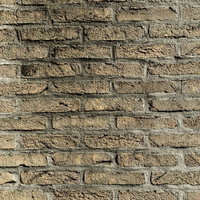 暗い影の残る古い煉瓦壁のテクスチャーの写真