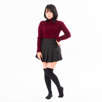 腰に手を当ててポージングするニーハイ女子の撮影会の写真