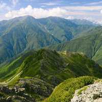 南アルプス南部・塩見岳遠景の山々と雲海が織りなす絶景の写真