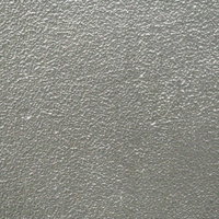 ざらついたグレーのコンクリート壁のテクスチャーの写真