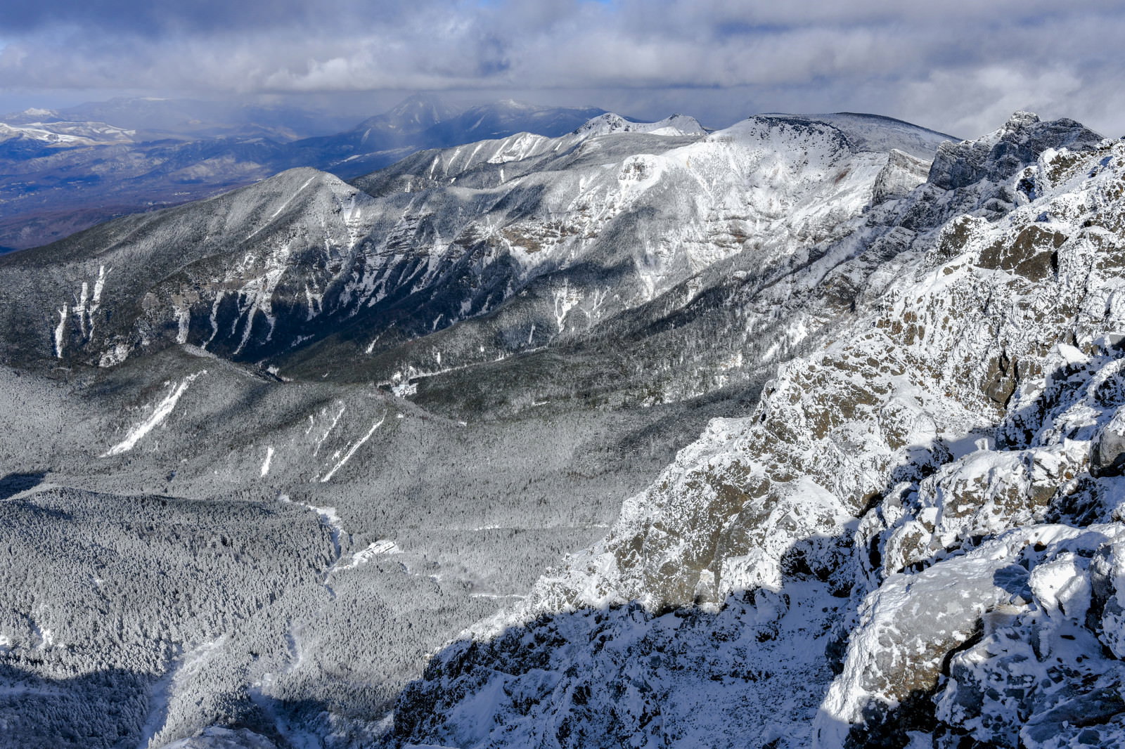 Forests of the Yatsugatake Mountains with Mt. Sulfur Covered in Clouds