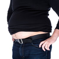 ショート丈トップスから露出する腹部のリバウンド王の写真