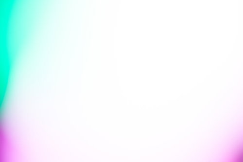 緑と紫の明るい光源がボケて広がるグラデーション