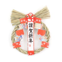 正月飾りのしめ縄と謹賀新年の飾りの写真