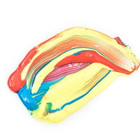 黄色と赤色と青色が流れるように混ざりあう三色の絵具の写真