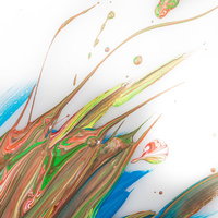 複数の色が混ざり合う塗料のアート作品の写真