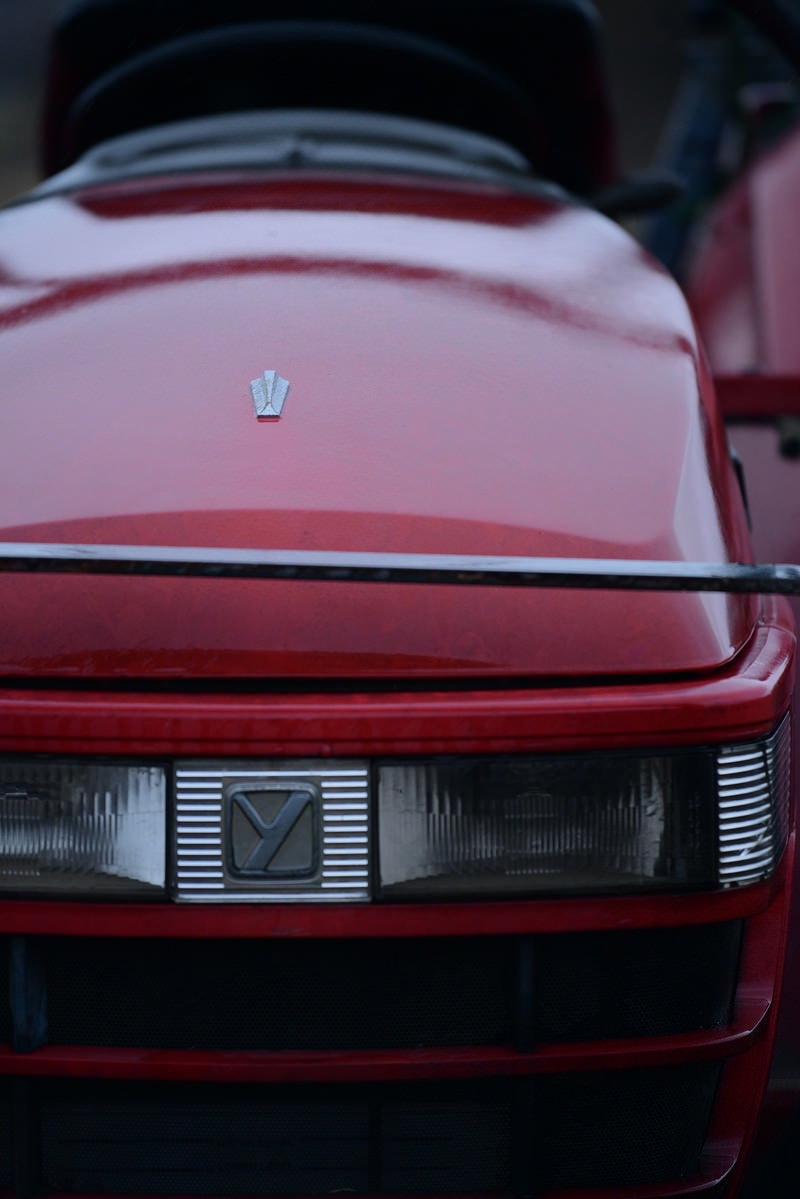 Front view of a bright red tractor