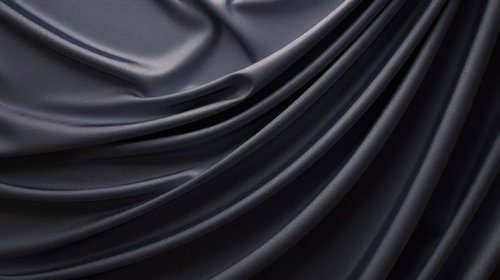 黒いサテンの渦巻くドレープデザイン光沢テクスチャー