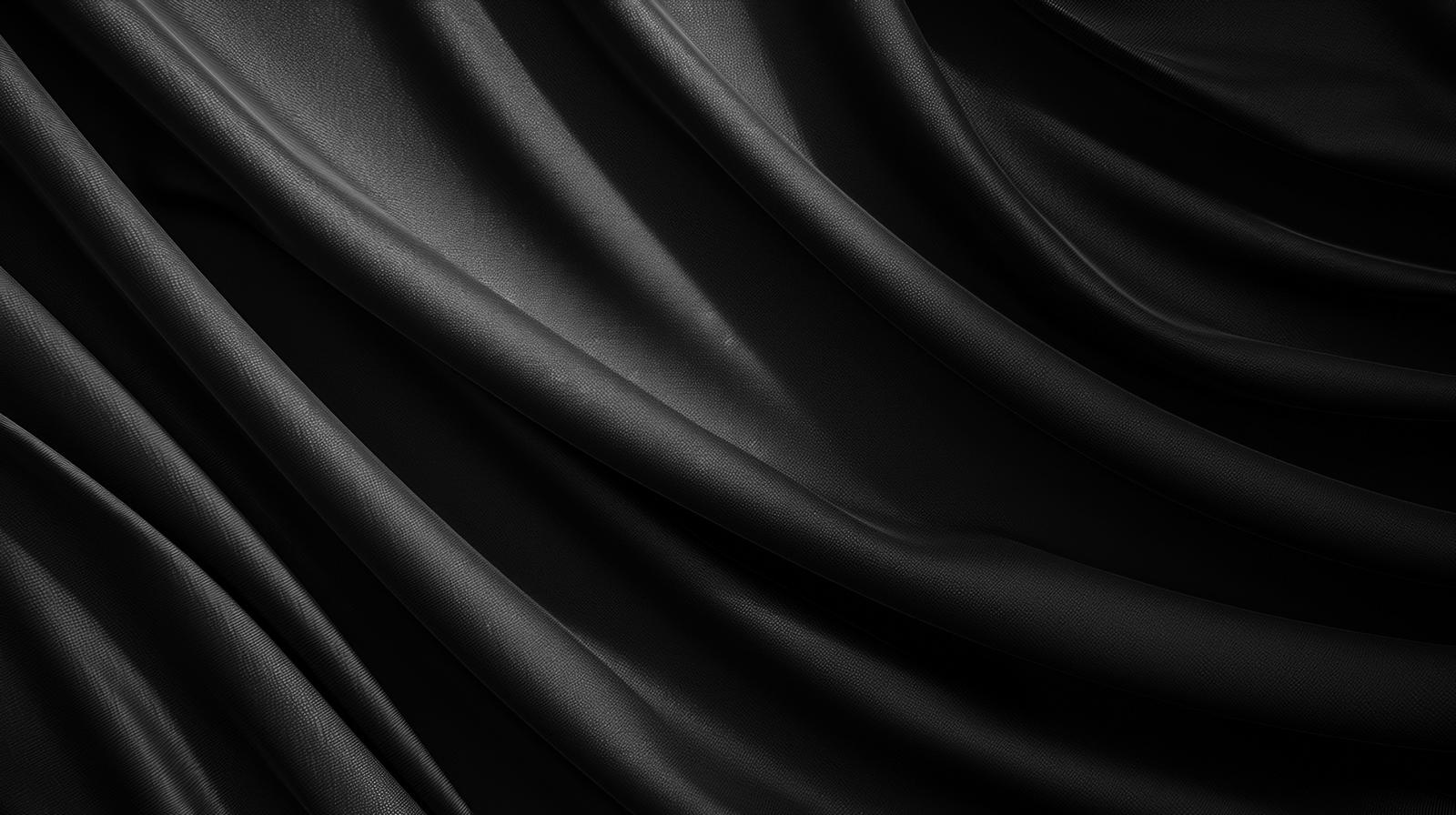黒いサテン生地の波打つドレープと光沢を表現した画像
