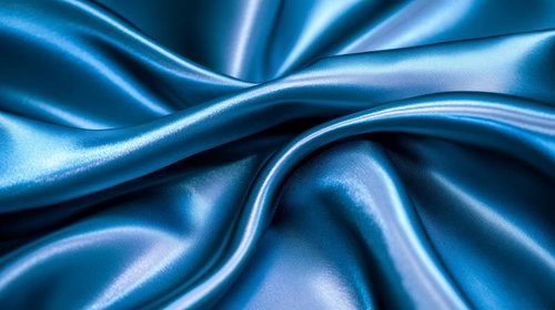 青いサテンの繊細なドレープ