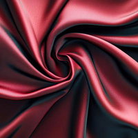 渦巻く深紅色のサテン生地の写真