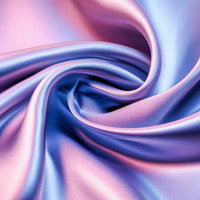 青紫とピンクが流れる優雅なサテンのドレープの写真