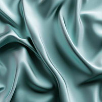光沢のあるミントグリーンのサテン生地のドレープの写真