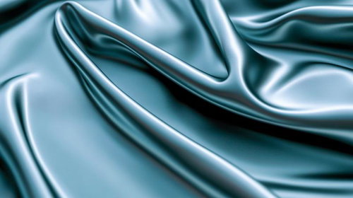 光沢を放つターコイズブルーのサテン生地のドレープ