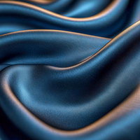 滑らかに波打つブルーサテンの光沢の写真