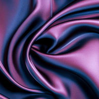 深みのあるパープルとネイビーが交差するサテン生地のドレープの写真