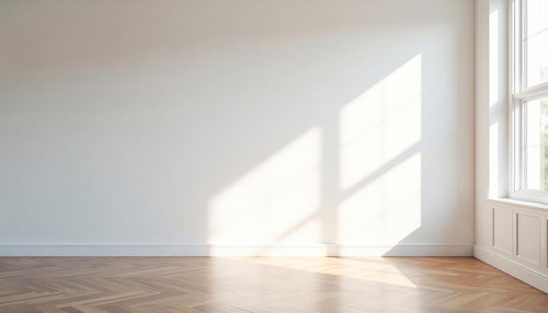 白壁にしみ込む自然光と木製床、モダンな空間の光と影