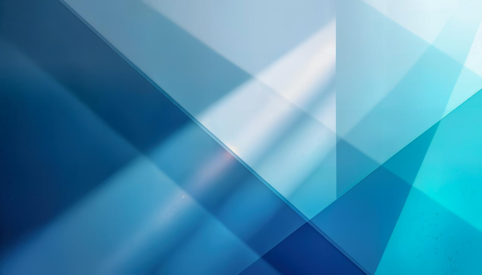 Abstract texture with blue translucent geometric planes overlapping diagonally