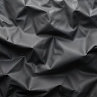 しわの寄った黒い革のテクスチャーのAI画像