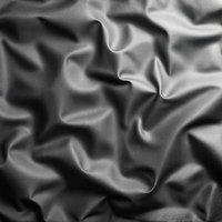 くしゃくしゃに丸めた黒いビニールのテクスチャーの写真