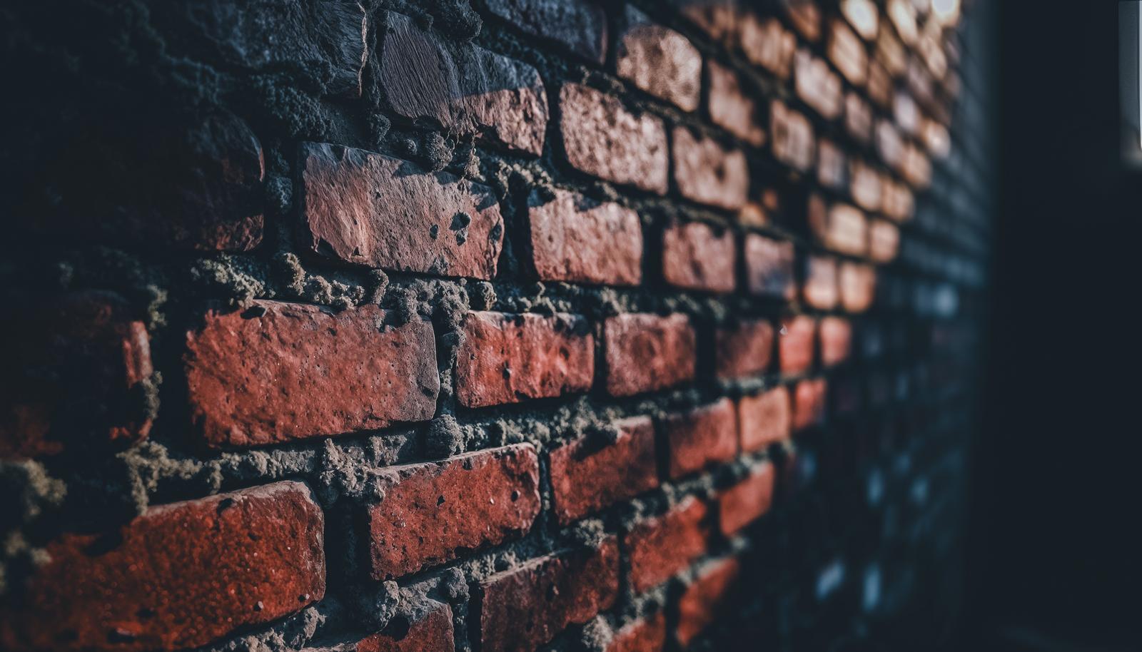 AI image of a red brick wall captured close-up from a diagonal angle with blurred background