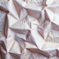 くしゃくしゃに丸めた柔らかい素材のテクスチャーの写真