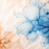 青と茶の染みが広がる抽象テクスチャーの写真