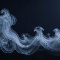 黒背景に漂う白い煙の渦の写真