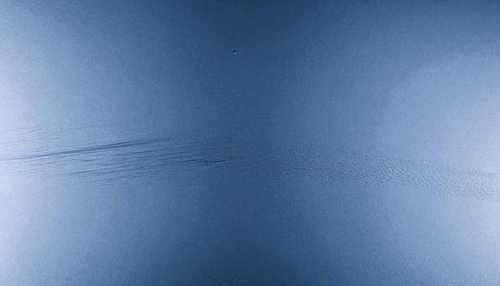 傷がついた青い表面のテクスチャー