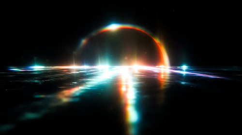 黒背景に光る虹色の光弧とレンズフレア効果