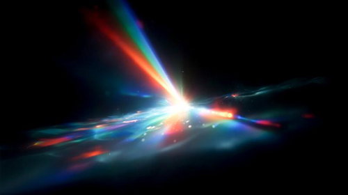 中央から放射状に広がる虹色の光線とプリズム効果