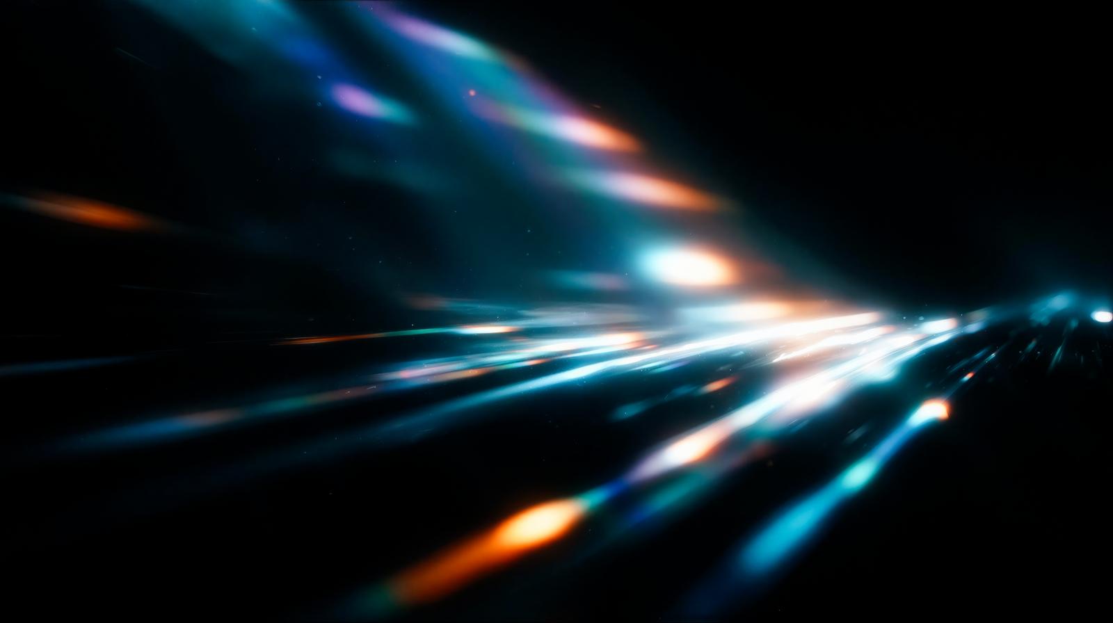 黒背景に青とオレンジの光線が斜めに流れるレンズフレア効果