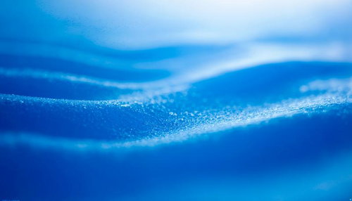 青く流れるウェーブの抽象背景のAI素材