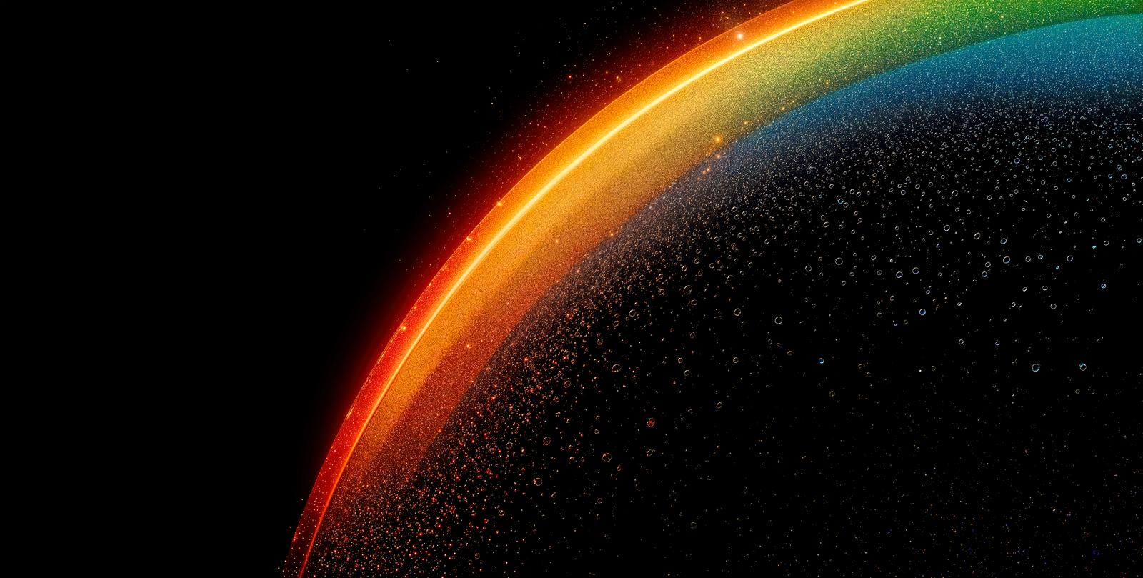 A shimmering rainbow-colored arch on a black background, with scattered golden particles.